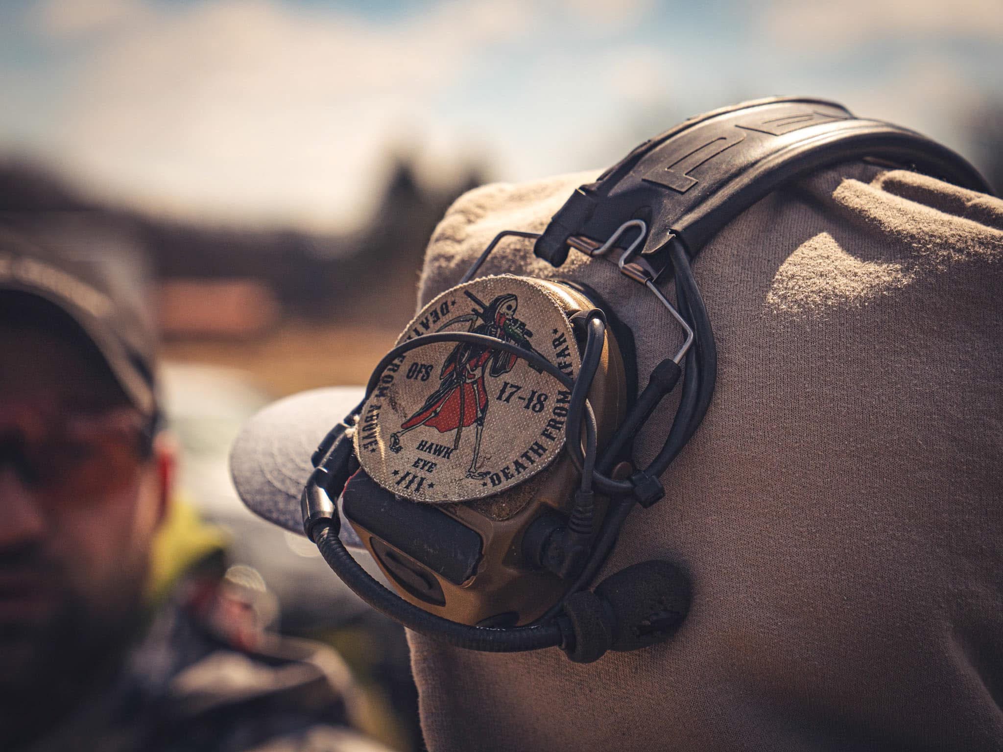 Shooter gear detail, electronic ear protection