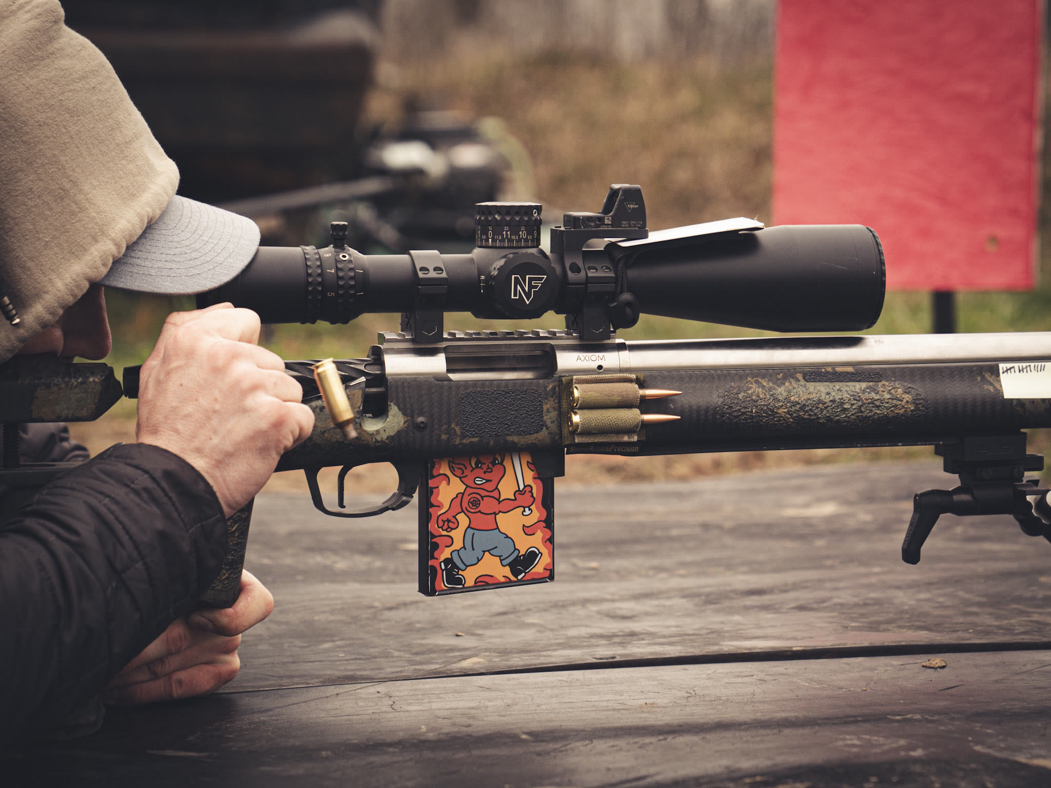 Precision rifle match action